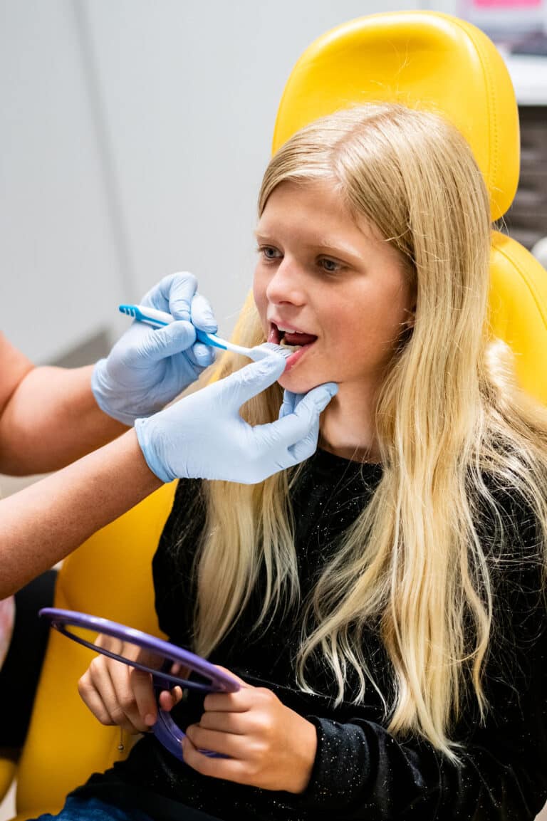 Child receiving dental sealants at Buckeye Pediatric Dentistry